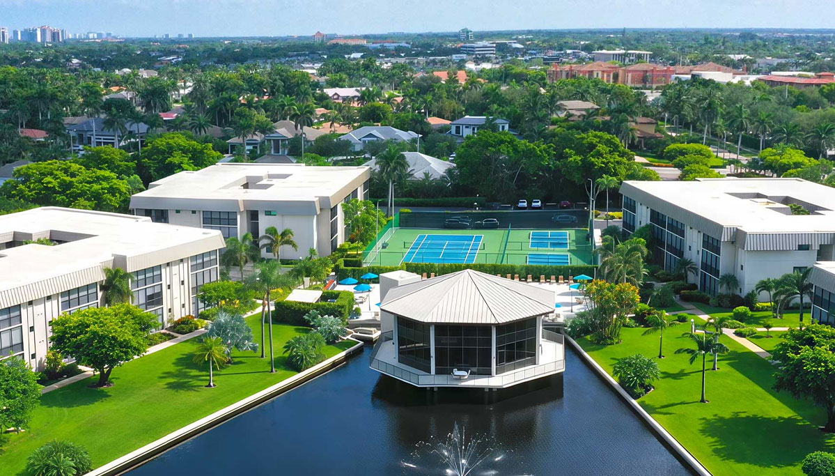 Aerial view of the Hidden Lake Villas community and surrounding Park Shore Naples, Florida area